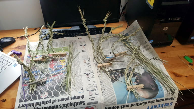 Rushes on newspaper (after peeling)