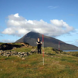 Archaeology student surveying at Caraun Point, Achill Island