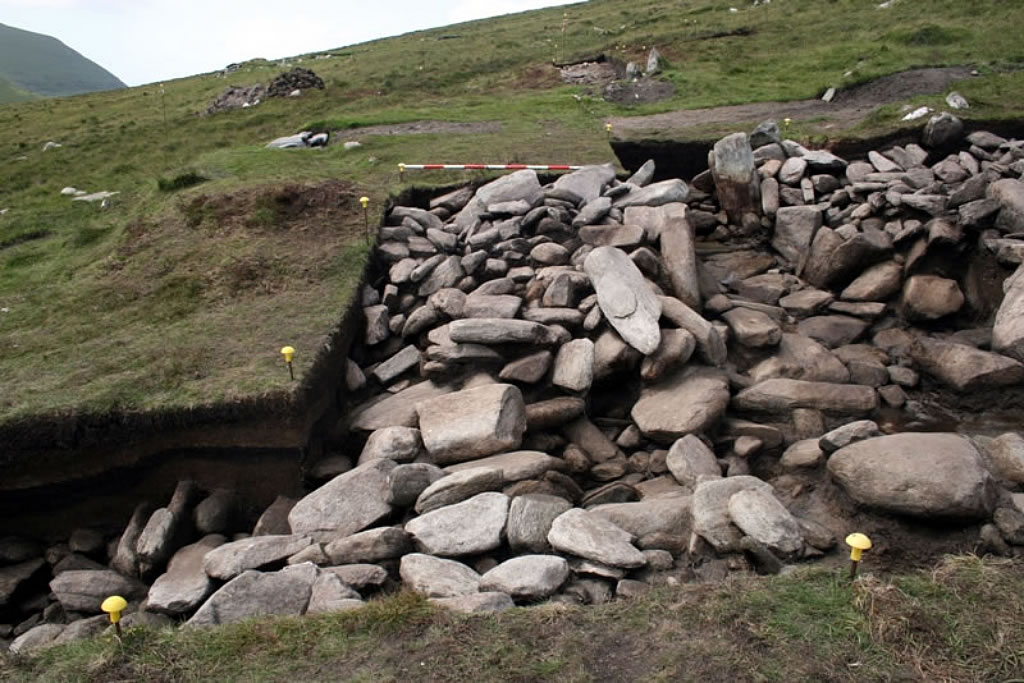 The pre-bog field wall connecting to the perimeter of Roundhouse 2 immediately south of the entrance passage.