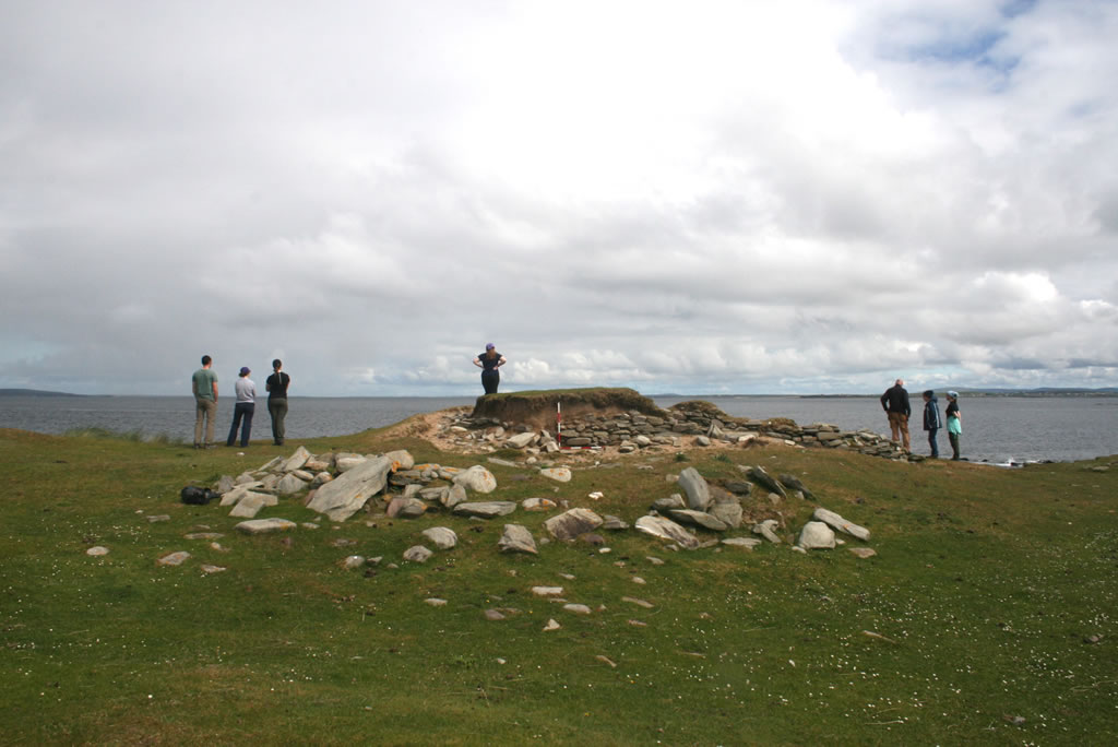 Archaeology students view the horizon at Caraun Point, Achill Island